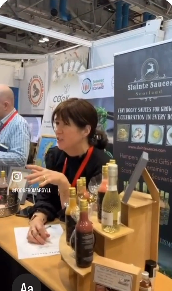 Scottish trade show, mairi talking to retailers at the Slàinte Sauces 